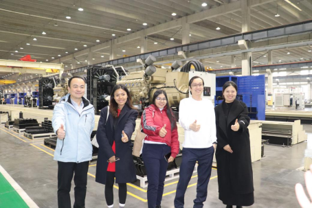 Client factory tour team photo